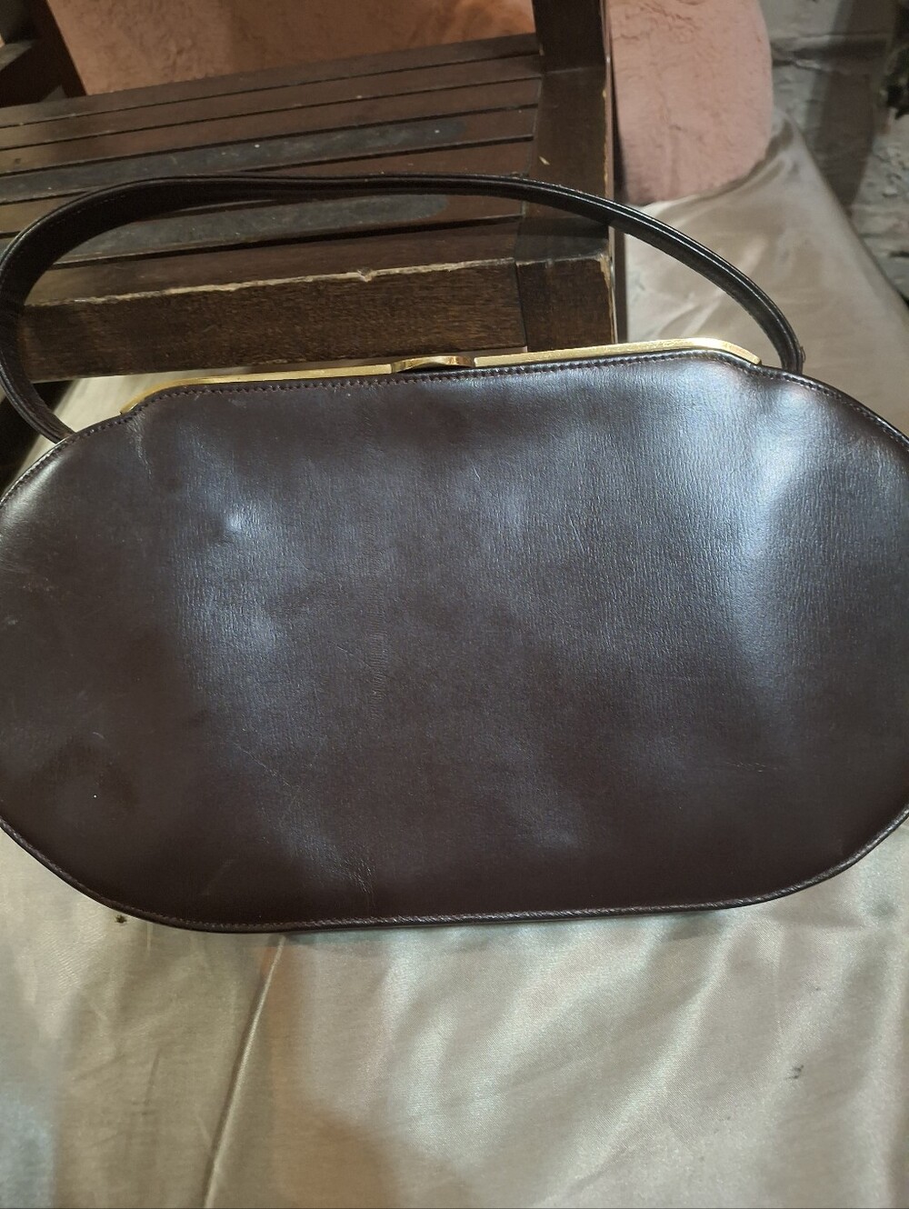 Structured Oval Shoulder Bag in Dark Brown with Gold Trim